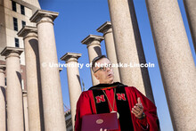 Chancellor Ronnie Green delivers his virtual commencement remarks front of the columns at the produc