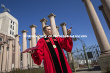Chancellor Ronnie Green delivers his virtual commencement remarks front of the columns at the produc
