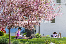 Kelsey Eihausen, sophomore from Bennington, and Molly Sambol, junior from Omaha, study outside of th