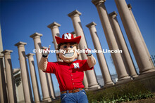 Herbie Husker in front of the columns by Memorial Stadium. On campus. April 30, 2020. 