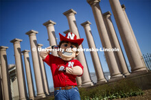 Herbie Husker in front of the columns by Memorial Stadium. On campus. April 30, 2020. 