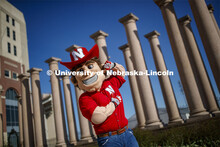 Herbie Husker in front of the columns by Memorial Stadium. On campus. April 30, 2020. 
