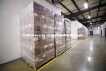 Pallets of boxes full of pieces for the 1,500+ hand sanitizer stations to be produced for the UNL ca