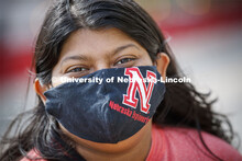 Sunandita Sarker, PhD student in mechanical engineering, wears a protective mask she made from one o