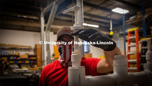 This is the thread adaptor made in a 3-D printer at Nebraska Innovation Studio that makes it possibl