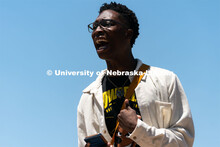 Kossi Joel Kouakou delivers a speech outside of Andersen Hall on Saturday, June 13, 2020, in Lincoln