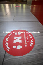 Symptoms guidelines and social distancing signs are strategically placed throughout the Rec Center. 