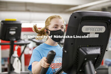 Ellenor Sell works out wearing her mask on the first day of Campus Recreation re-opening after being