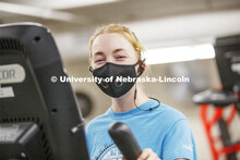 Ellenor Sell works out wearing her mask on the first day of Campus Recreation re-opening after being