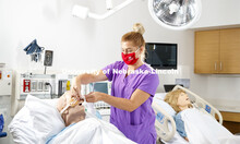 Tia Stevenson, staff member with the University Health Center and College of Nursing, demonstrates i