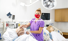 Tia Stevenson, staff member with the University Health Center and College of Nursing, demonstrates i
