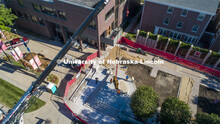 A stainless-steel N is the centerpiece of the Alumni Association's remodeled Holling Garden. Designe
