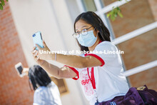 Sandhya Karki takes a selfie of herself wearing a mask. Photo shoot of students wearing masks and pr