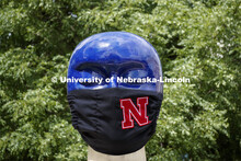 Untitled by Jun Kaneko in the Sheldon Sculpture Garden wearing a photoshopped mask. The sculpture is