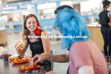 Students eating in the Willa Cather Dining Center. Photo shoot of students wearing masks and practic