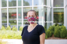 Drea Poole, a senior in Global Studies, Women's and Gender Studies wears a mask. Photo shoot of stud