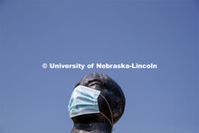 Floating Figure, a sculpture by Gaston Lachaise, is one of many UNL campus sculptures wearing masks.