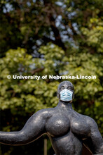 Floating Figure, a sculpture by Gaston Lachaise, is one of many UNL campus sculptures wearing masks.