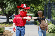 Herbie Husker wears a protective mask while he poses on campus. July 09, 2020. 
