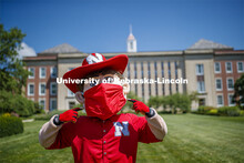 Herbie Husker wears a protective mask while he poses on campus. July 09, 2020. 