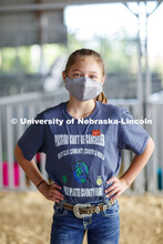 A young participant shows off her mask. The Platte County Fair in Columbus, NE, changed this year be