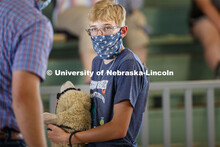 Paul Littlefield of Surprise, Nebraska, eyes the judge during the Registered Breeding Ewes class.  H
