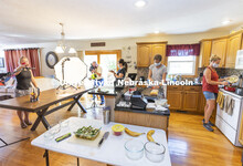 From left: Courtney Eitzmann works on a stop action video, Craig Chandler photographs a dish, Kayla 