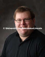 Studio portrait of Joshua Renner, Research Compliance Services Specialist for Sponsored Programs for