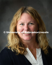 Studio portrait of Sarah Hansen, Grants Coordinator for Sponsored Programs for the Office of Researc
