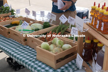 Vendors selling their produce at the Fallbrook Farmers Market in northwest Lincoln, Nebraska. July 2