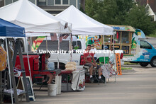 Vendors selling their produce at the Fallbrook Farmers Market in northwest Lincoln, Nebraska. July 2