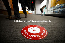 Stickers with elephant feet help patrons keep social distancing in the museum. The Nebraska State Mu