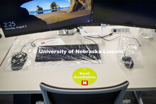 A seat-available sticker marking in the computer lab of the Johnny Carson Emerging Media Center. Cre
