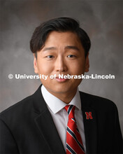 Studio portrait of Tamayo Zhou, Graduate Assistant, OASIS. August 3, 2020. 