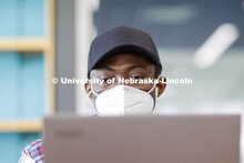 Isaac Kyei, a graduate student in chemistry, studies in Love Library North. August 4, 2020. 