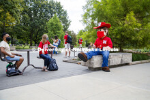 Photo shoot of students with Herbie on city campus display mask wearing, social distancing. Students