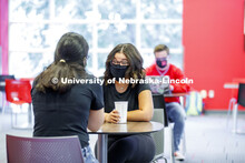 Photo shoot of students on city campus display mask wearing, social distancing. Students wearing mas