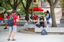 Photo shoot of students on city campus display mask wearing and social distancing. Students wear mas