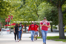 Photo shoot of students on city campus display mask wearing and social distancing. Students wearing 
