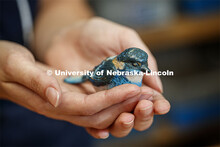 Kinga Aletto, junior in College of Agriculture Sciences and Natural Resources, works on a life-size 