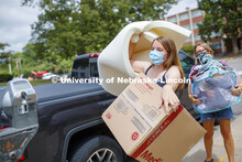 Faith Miller, a sophomore from St. Joseph, MO, moves into the Alpha Omicron Pi house Tuesday afterno