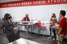 Students wear masks as they study in the Lynn and Dana Roper Media Studio in Anderson Hall. Photo sh