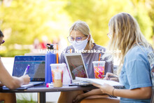 Alexis Carter studies with fellow Alpha Phi sorority members outside of Adele Coryell Hall Learning 