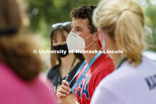 Dylan Beck of Lincoln, listens to CASNR Dean Tiffany Heng-Moss talk with students during the Launch.