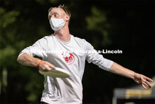 Senior Josh Adams throws a frisbee during the HuskerMania Masker Singer event at Mabel Lee Fields. A