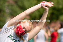 A student performs a yoga pose during Wellness Fest at Meier Commons. August 22, 2020. 