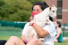 Sophomore Zoey Doan holds a goat during Wellness Fest at Meier Commons. August 22, 2020. 