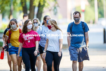 Students are masked up as they cross campus to get to their classes. First day for in-person learnin