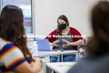 Jessica Poli teaches her ENGL 150 Writing and Inquiry class in Andrews Hall Monday morning. First da