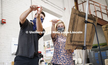 Camryn Burkhalter, a sophomore from Omaha, gets instruction of measuring for perspective from instru